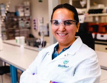 BlueRock Therapeutics scientist smiling in a lab